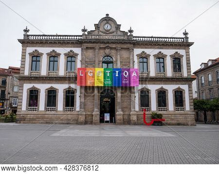 Pontevedra, Spain - July 25, 2021: 
Town Hall Building Decorated With Lgbtqia Pride Flag Colors, Pon