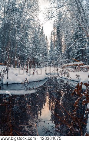 Green Wellspring, The Source Of Natural Mineral Water In The Forest Of Mari El, Russia, Winter Natur