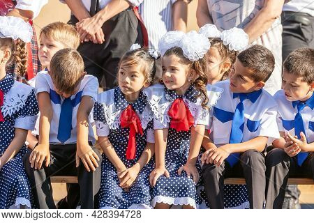Krasnodar, Russia - September 1, 2020: First-form Schoolchildren At School On Holiday Of Beginning O