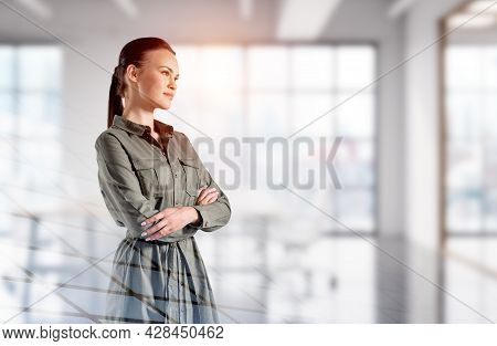 Confident Attractive Woman In Casual Hacky Dress In Crossed Arm Pose Is Pondering About Life And Edu