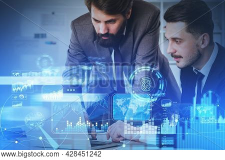Two Thoughtful Businessmen With Laptop, Digital Interface Of Blue Glowing Data Information Protectio
