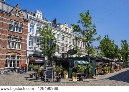 Maastricht, Netherlands - July 21, 2021: Restaurant And Flower Shop In The Wyck Naioghbourhood Of Ma