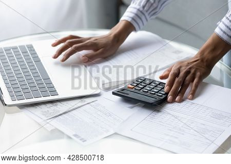 Close Up Of Ethnic Woman Calculate Expenses Manage Budget