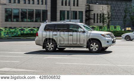 Moscow, Russia - August 2021: Side View Of Lexus Lx 570 Third Generation J200 Suv In Motion. White P