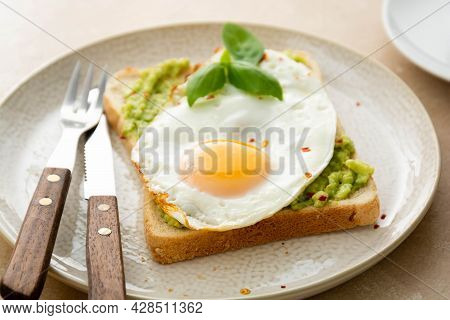 Avocado Toast With Fried Eggs And Fresh Green Peas, Ccoffee Cups. Healthy Breakfast, Keto Food. Diet