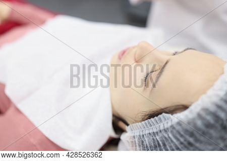 Woman Lies In Beauty Salon Before Rejuvenating Procedure