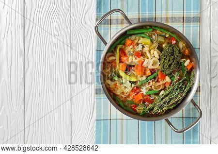 Vegetarian Summer Soupe Au Pistou, French Vegetable Bean Soup With Sauce Pesto And Herbs In A Metal 
