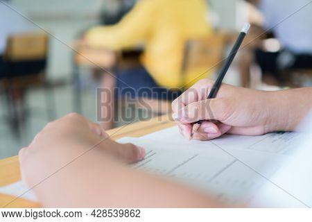 School In Exam, Hands Students Learning Exams In Classroom Pupil  Student's Read Note Taking Admissi