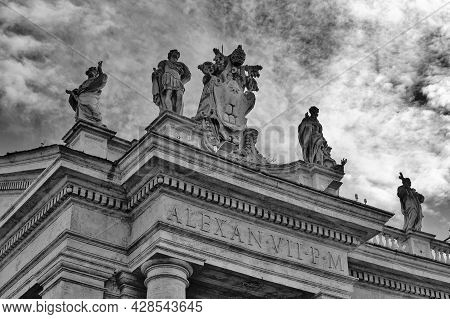 Details Of The Entablature With Statues Of Religious Saints On The Colonnades Of St. Peter's Basilic