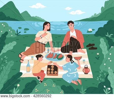 Happy Asian Family On Picnic In Nature. Mother, Father And Children Eating Food Outdoors On Summer H