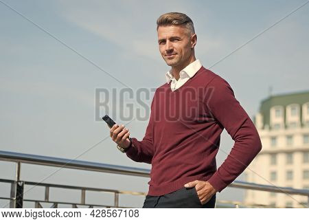 Managing Business In Real Time. Businessman Text Sms Via Smartphone. Handsome Man Arrange Business M