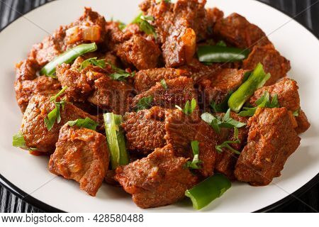 Tibs Is An Ethiopian Dish Consisting Of Stir-fried Meat And Vegetables Closeup In The Plate On The T