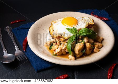 Thai Food Concept Khao Pad Krapao Kai Authentic Thai Basil Chicken Rice And Crispy Fried Egg Topping