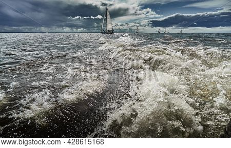 Competition Of Sailboats In Regatta At Storm Weather, Race, Big Waves, Sail Regatta, Cloudy Weather,