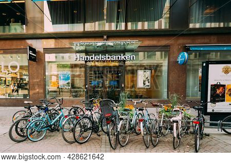 Helsinki, Finland - July 28, 2014: View Of Kluuvikatu Street. Parked Bicycles On Sidewalk.