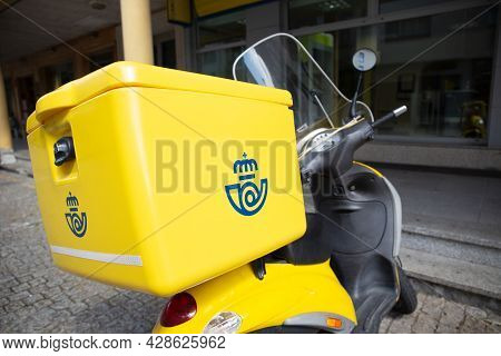 Santiago De Compostela, Spain. August 2, 2021: Correos Bike. Spanish Post Office Delivery Motorcycle