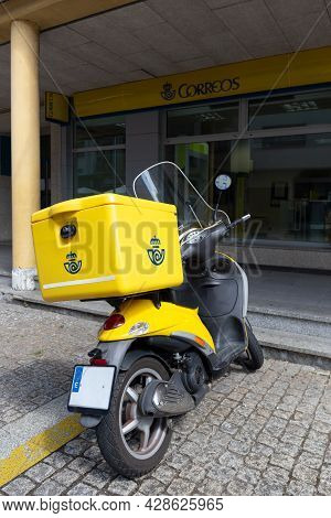 Santiago De Compostela, Spain. August 2, 2021: Correos Bike. Spanish Post Office Delivery Motorcycle