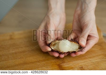 Ripe Rambutan And Leechy Or Lychee Fruits On Wooden Table. Healthy Food, Fresh Organic Fruit.