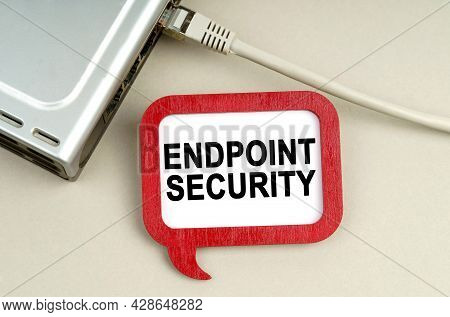 Internet And Security Concept. There Is A Router Connected To The Network On The Table, Next To A Si