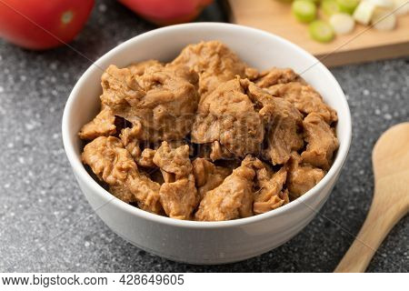 Bowl with raw Asian Seitan, wheat gluten, close up 