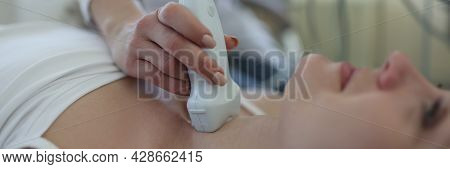 Uzist Doctor Conducts Medical Examination Of Thyroid Gland Of Woman