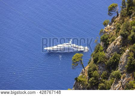 Picturesque View Of The Tyrrhenian Sea Near The Beach Marina Piccola, A Luxury Yacht On Background O