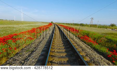 Quick Trip On Rails. Shot. Beautiful View Of Rails From Moving Train. Fast Train Ride On Rails On Ba