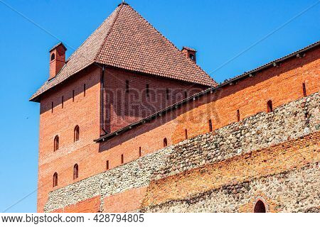 Lida, Belarus - July 10, 2021: Archeological Monument Medieval Stone Lida Castle, Historical Show Pl