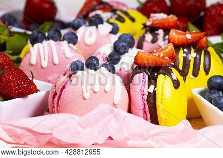 Macaroon, Handmade Beautiful Sweet Food, Dessert With Fresh Strawberries And Blueberries Decorated W