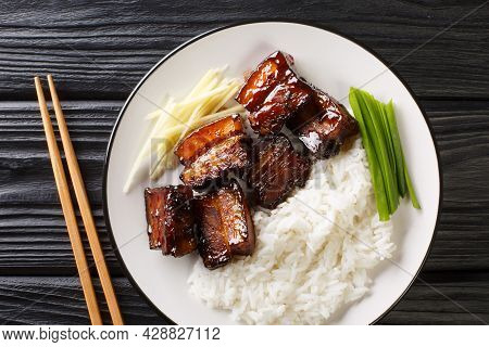 Rafute Is The Okinawan Version Of Simmered Pork Belly Served With Rice Closeup In The Plate On The T