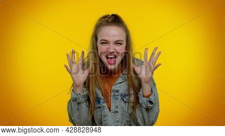 Little Bit Crazy. Teen Stylish Girl In Denim Jacket Demonstrating Tongue Out, Fooling Around, Making