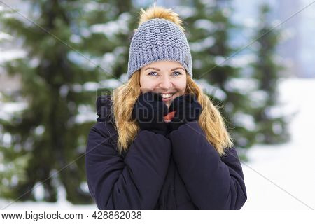 Portrait Beautiful Happy Girl Whitework Smile Teeth, Blue Eyes On Spruce Background In Frosty Day. A