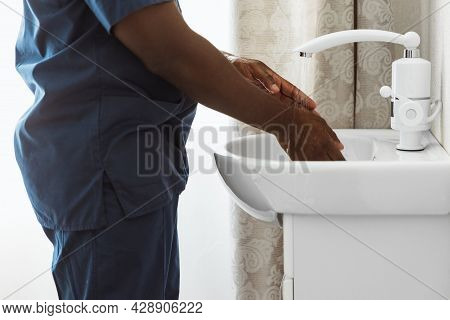 Close-up Doctor, Therapeutic Or Medical Advisor Washing His Hands Before Surgery At Medical Office, 