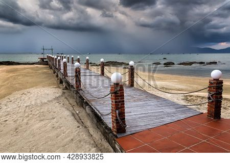 Wharf Leading Out To Storm In Vietnam