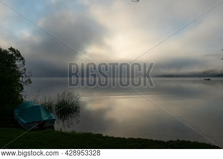 An Early Morning At Lac De Joux, Switzerland: Beautiful Scenery With Fog And The Rising Sun