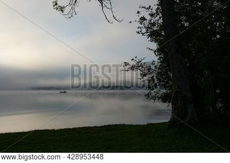 An Early Morning At Lac De Joux, Switzerland: Beautiful Scenery With Fog And The Rising Sun