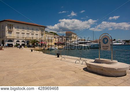Porec, Croatia- July 10th 2021. A Coastal Road In The Harbour Area Of The Historic Medieval Coastal 
