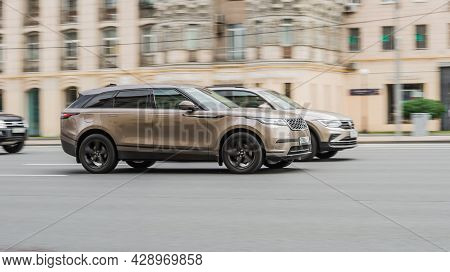 Moscow, Russia - August 2021: Two Suv Cars Racing At High Speed On City Highway With Motion Blur. Be