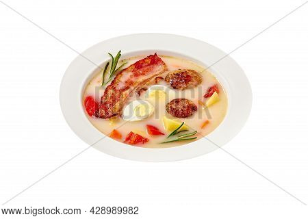 Polish Soup Zur With Bacon, Sausages And Egg Isolated On White