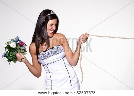 Anger bride pulling a rope,involuntary marriage