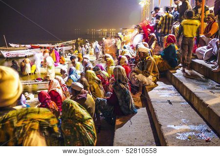 People In The Night In Varanasi In Religious Washing Ceremony