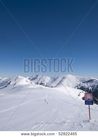 A Sign In The Austrian Alps Wich Says Danger Of Avalanches