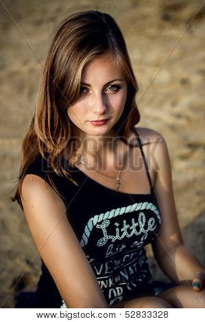 Beauty portrait of girl on the beach