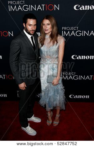NEW YORK- OCT 24: Phil Winser (L) and Dree Hemingway attend the premiere of Canon's 