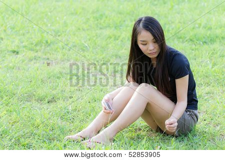 Profile Of A Young Asian Woman In Lawn