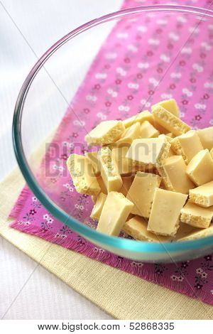 Bar Of White Chocolate Broken Into Pieces