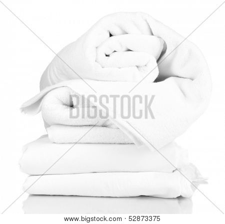 Stack of rumpled bedding sheets isolated on white