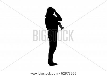 Silhouette Of A Girl With A Camera