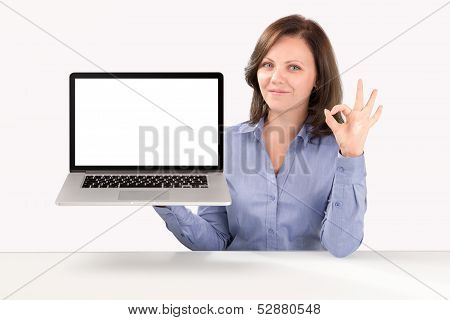Business Woman Is Holding A Laptop