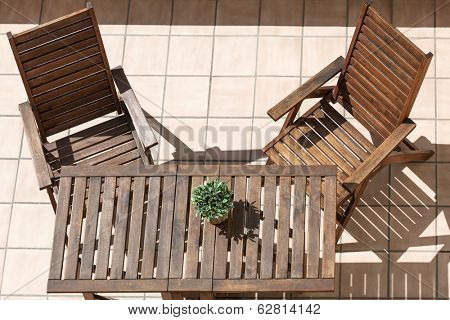 folding chair and table on a sunny day
